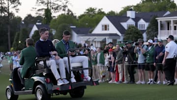 Apr 13, 2025; Augusta, Georgia, USA; Rory McIlroy takes a golf cart to the press building following the green jacket ceremony during the final round of the Masters Tournament at Augusta National Golf Club. Mandatory Credit: Grace Smith-Imagn Images