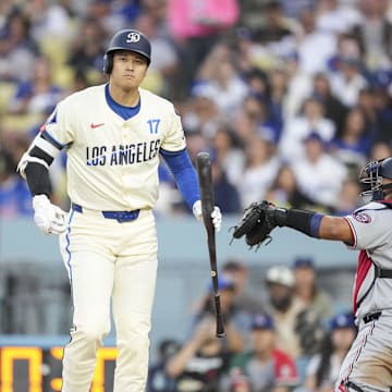 Jun 21, 2025; Los Angeles, California, USA; Los Angeles Dodgers two-way player Shohei Ohtani (17) strikes out in the third inning against the Washington Nationals at Dodger Stadium. Mandatory Credit: Kirby Lee-Imagn Images