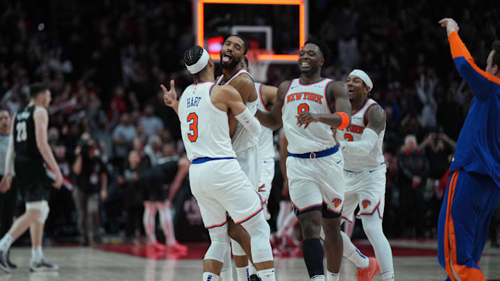 Mar 12, 2025; Portland, Oregon, USA; New York Knicks small forward Mikal Bridges (25) celebrates with teammates after making the game-winning shot in overtime against the Portland Trail Blazers at Moda Center. Mandatory Credit: Soobum Im-Imagn Images Mar 12, 2025; Portland, Oregon, USA; New York Knicks small forward Mikal Bridges (25) celebrates with teammates after making the game-winning shot in overtime against the Portland Trail Blazers at Moda Center. Mandatory Credit: Soobum Im-Imagn Images