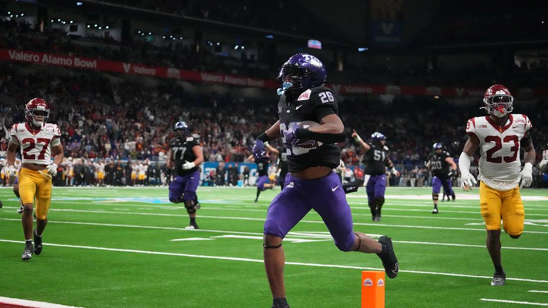 Dec 30, 2025; San Antonio, TX, USA; TCU Horned Frogs running back Jeremy Payne (26) scores on a 35-yard touchdown reception in overtime for the winning score against the Southern California Trojans during the Alamo Bowl at Alamodome. Mandatory Credit: Kirby Lee-Imagn Images