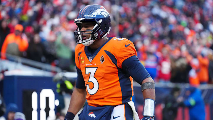Oct 29, 2023; Denver, Colorado, USA; Denver Broncos quarterback Russell Wilson (3) celebrates a touchdown pass in the fourth quarter against the Kansas City Chiefs at Empower Field at Mile High. Mandatory Credit: Ron Chenoy-Imagn Images