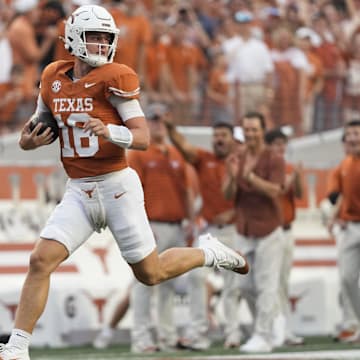 Texas QB Arch Manning (16) runs for a TD during the first half against UTSA at Darrell K Royal-Texas Memorial Stadium. 