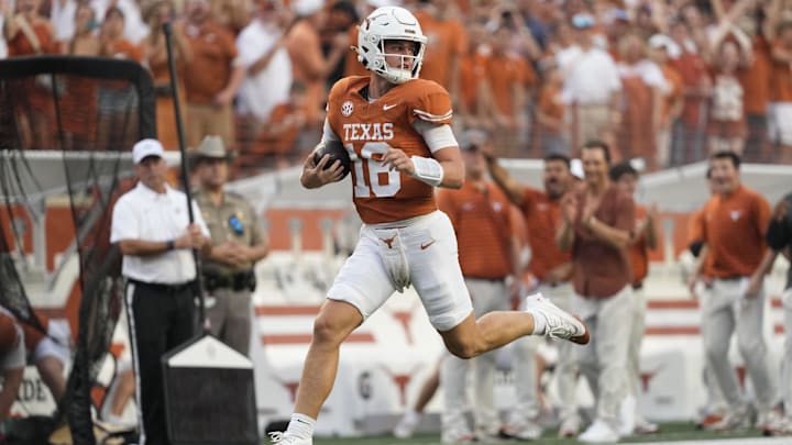 Texas QB Arch Manning (16) runs for a TD during the first half against UTSA at Darrell K Royal-Texas Memorial Stadium. 