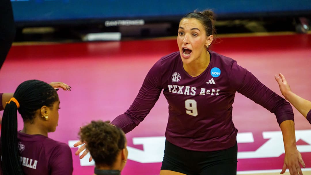 Dec 12, 2025; Lincoln, NE, USA; Texas A&M Aggies opposite Logan Lednicky (9) reacts after a point against the Louisville Cardinals during the fourth set at Bob Devaney Sports Center. Mandatory Credit: Dylan Widger-Imagn Images