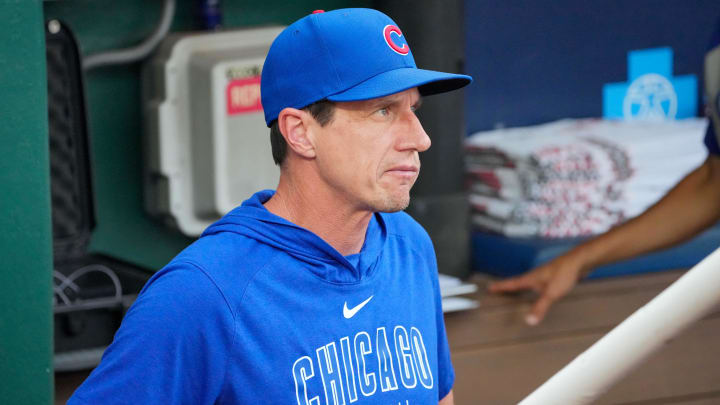 Jul 26, 2024; Kansas City, Missouri, USA; Chicago Cubs manager Craig Counsell (30) in the dugout against the Kansas City Royals prior to a game at Kauffman Stadium.