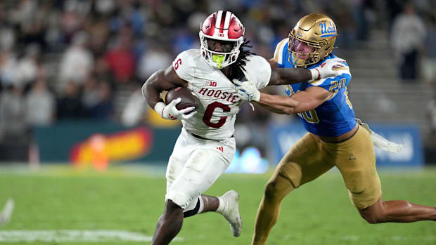 Sep 14, 2024; Pasadena, California, USA; Indiana Hoosiers running back Justice Ellison (6) carries the ball against UCLA Brui