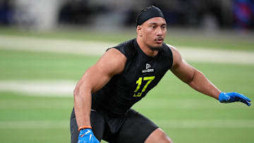 Feb 27, 2025; Indianapolis, IN, USA; Miami linebacker Francisco Mauigoa (LB17) participates in drills during the 2025 NFL Combine at Lucas Oil Stadium. Mandatory Credit: Kirby Lee-Imagn Images