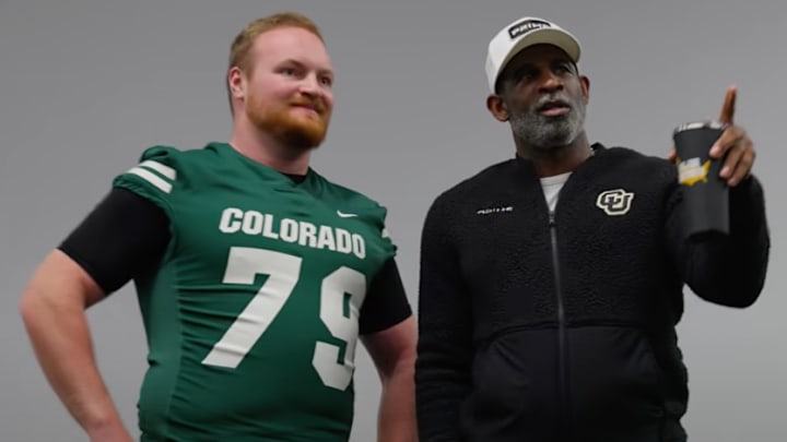 Sanders giving Dempsey some pointers. Sanders giving Dempsey some pointers.