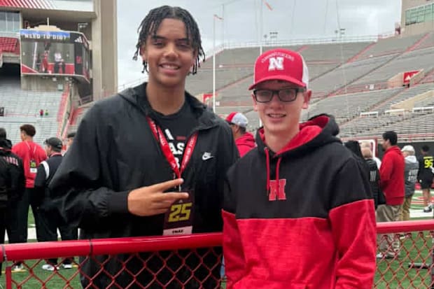 Nebraska football commit Trae Taylor with a Nebraska Cornhuskers fan