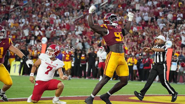 Sep 4, 2026; Los Angeles, California, USA; Southern California Trojans defensive tackle Jide Abasiri (97) celebrates after an incomplete pass by Fresno State Bulldogs quarterback Jayden Mandal (7) in the first half at United Airlines Field at Los Angeles Memorial Coliseum. Mandatory Credit: Kirby Lee-Imagn Images