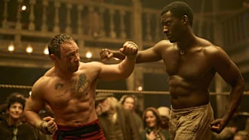 Stephen Graham as Sugar Goodson and Malachi Kirby as Hezekiah Moscow duking it out in A Thousand Blows. Credit: (Disney/Robert Viglasky)