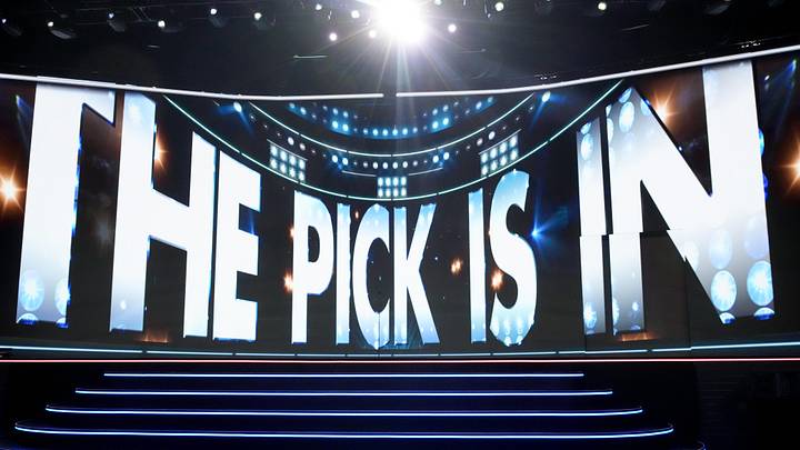 Jun 27, 2025; Los Angeles, California, USA; The video board shows the 20th overall pick for the Columbus Blue Jackets is about to be announced in the first round of the 2025 NHL Draft at Peacock Theater. Mandatory Credit: Kirby Lee-Imagn Images