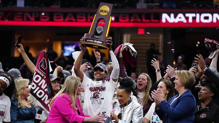 South Carolina basketball forward Sania Feagin with the 2023-2024 National Championship trophy