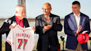 Team owner Bob Castellini shows off a Reds jersey for new manager Terry Francona during an event to introduce the new manager of the Cincinnati Reds at Great American Ball Park in downtown Cincinnati on Monday, Oct. 7, 2024.