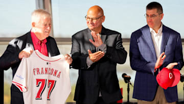 Team owner Bob Castellini shows off a Reds jersey for new manager Terry Francona during an event to introduce the new manager of the Cincinnati Reds at Great American Ball Park in downtown Cincinnati on Monday, Oct. 7, 2024.