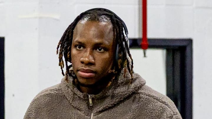 Feb 23, 2025; New Orleans, Louisiana, USA;  San Antonio Spurs center Charles Bassey (28) arrives at the arena before the game against the New Orleans Pelicans at Smoothie King Center. Mandatory Credit: Stephen Lew-Imagn Images