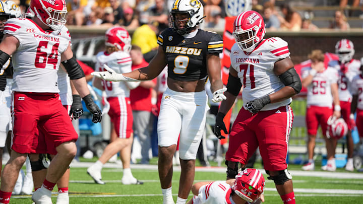Missouri Tigers defensive end Zion Young (9) celebrates after a sack, in a game against the Louisiana-Lafayette Ragin Cajuns this season.