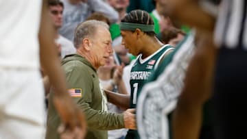 Michigan State Spartans head coach Tom Izzo (left) has a conversation with guard Jeremy Fears Jr. (right) during a game against the San Jose State Spartans on Thursday, Nov. 13, 2025.