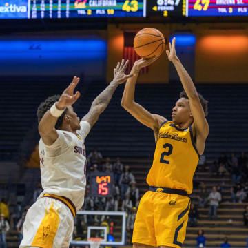 Cal Golden Bears forward Monty Bowser shoots over an Arizona State defender in 2023