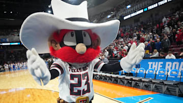 Mar 22, 2025; Wichita, KS, USA; Texas Tech Red Raiders mascot Raider Red gestures on the court before the game between the Texas Tech Red Raiders and the Drake Bulldogs at Intrust Bank Arena. Mandatory Credit: Kirby Lee-Imagn Images