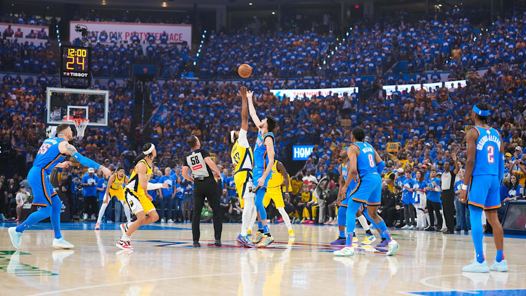 Jun 22, 2025; Oklahoma City, Oklahoma, USA; Oklahoma City Thunder forward Chet Holmgren (7) and Indiana Pacers center Myles Turner (33) jump at the opening tip-off for Game 7 of the 2025 NBA Finals at Paycom Center. Mandatory Credit: Kyle Terada-Imagn Images
