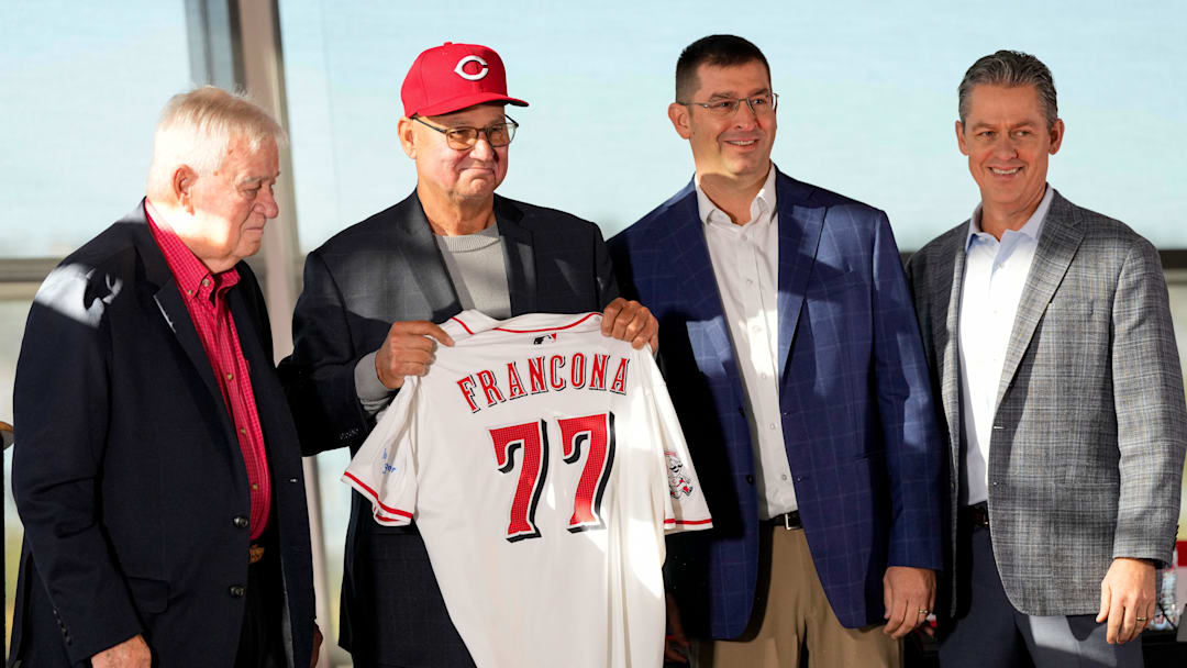 New Cincinnat Reds manager Terry Francona holds his new jersey on stage with (left to right) team owner Bob Castellini, President of Baseball Operation, Nick Krall, and General Manager Brad Meador, during an event to introduce the new manager of the Cincinnati Reds at Great American Ball Park in downtown Cincinnati on Monday, Oct. 7, 2024.