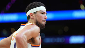 Jan 27, 2025; Phoenix, Arizona, USA; Phoenix Suns guard Devin Booker (1) looks on against the LA Clippers during the second half at Footprint Center. Mandatory Credit: Joe Camporeale-Imagn Images