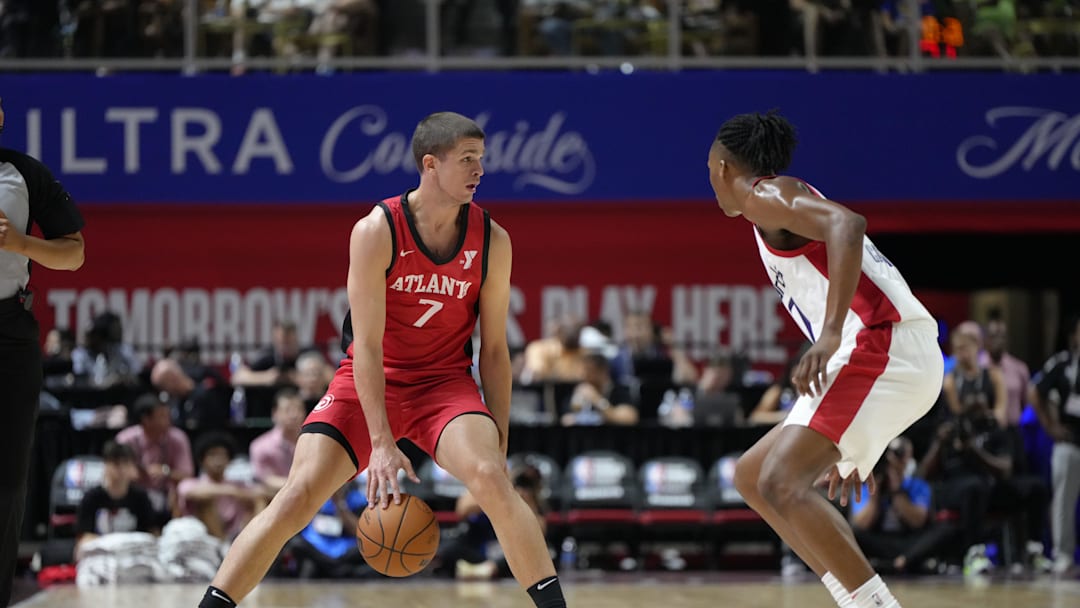 Jul 12, 2024; Las Vegas, NV, USA; Atlanta Hawks forward/guard Nikola Durisic (7) controls the ball against Washington Wizards guard Bub Carrington (17) during the first half at Thomas & Mack Center. Mandatory Credit: Lucas Peltier-Imagn Images Jul 12, 2024; Las Vegas, NV, USA; Atlanta Hawks forward/guard Nikola Durisic (7) controls the ball against Washington Wizards guard Bub Carrington (17) during the first half at Thomas & Mack Center. Mandatory Credit: Lucas Peltier-Imagn Images