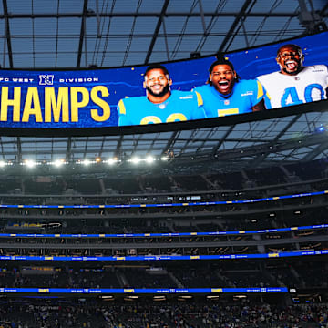 Jan 9, 2022; Inglewood, California, USA; A board congratulates the Los Angeles Rams as the NFC West Division champions after their game against the San Francisco 49ers at SoFi Stadium. Mandatory Credit: Kirby Lee-Imagn Images