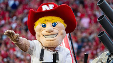 Sep 14, 2024; Lincoln, Nebraska, USA; Nebraska Cornhuskers mascot Herbie Husker rides around the field between the first and second quarter against the Northern Iowa Panthers at Memorial Stadium. Mandatory Credit: Dylan Widger-Imagn Images