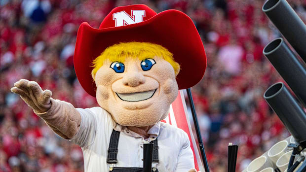 Nebraska Cornhuskers mascot Herbie Husker rides around the field between the first and second quarter