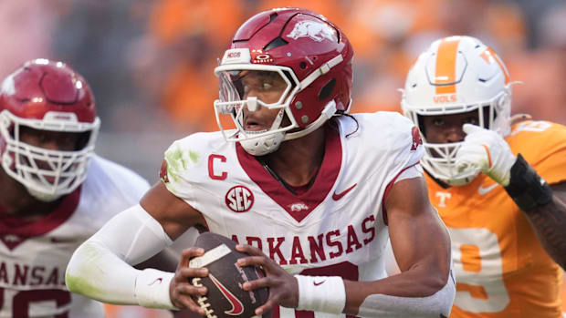 Arkansas quarterback Taylen Green scrambles against Tennesse