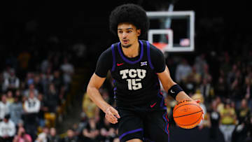 Mar 8, 2025; Boulder, Colorado, USA; TCU Horned Frogs forward David Punch (15) controls the ball in the first half against the Colorado Buffaloes at the CU Events Center. Mandatory Credit: Ron Chenoy-Imagn Images