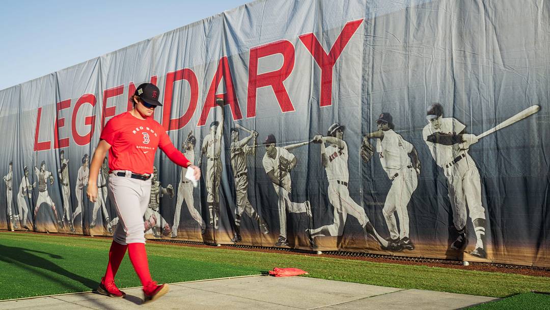 Red Sox prospect Blaze Jordan walks past a sign at JetBlue Park in Fort Myers, Florida, during spring training.