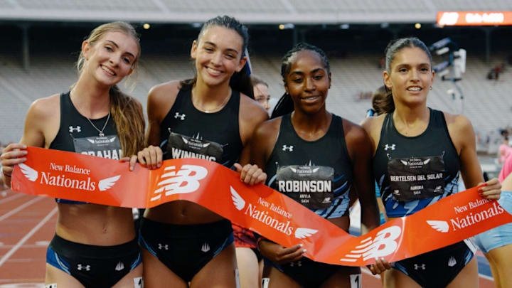 IMG's historic girls 4x800 relay team of (from left) Daniel Graham, Aurora Bertelsen Del Solar, Anyla Robinson and Mackenzie Winning became the first team to sweep titles at all four major meets, capped by a victory at the 2025 Outdoor Nationals.