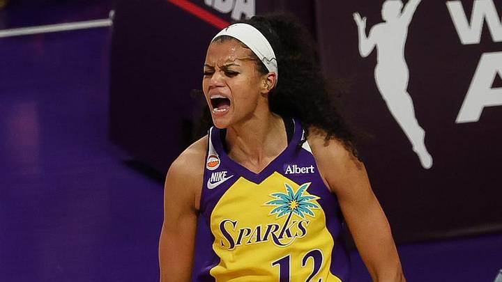 Jun 21, 2026; Los Angeles, California, USA;  Los Angeles Sparks guard-forward Rae Burrell (12) celebrates the an one at Crypto.com Arena. Mandatory Credit: William Navarro-Imagn Images