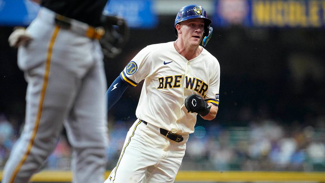 Aug 4, 2026; Milwaukee, Wisconsin, USA; Milwaukee Brewers right fielder Cooper Pratt (12) scores from second base against the Pittsburgh Pirates in the fourth inning at American Family Field. Mandatory Credit: Michael McLoone-Imagn Images