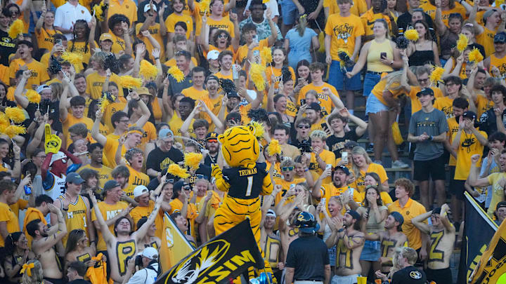 Aug 29, 2024; Columbia, Missouri, USA;  The Missouri Tigers mascot Truman sprays water on fans against the Murray State Racers prior to a game at Faurot Field at Memorial Stadium. Mandatory Credit: Denny Medley-Imagn Images