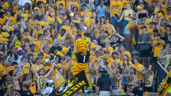 Aug 29, 2024; Columbia, Missouri, USA;  The Missouri Tigers mascot Truman sprays water on fans against the Murray State Racers prior to a game at Faurot Field at Memorial Stadium. Mandatory Credit: Denny Medley-USA TODAY Sports