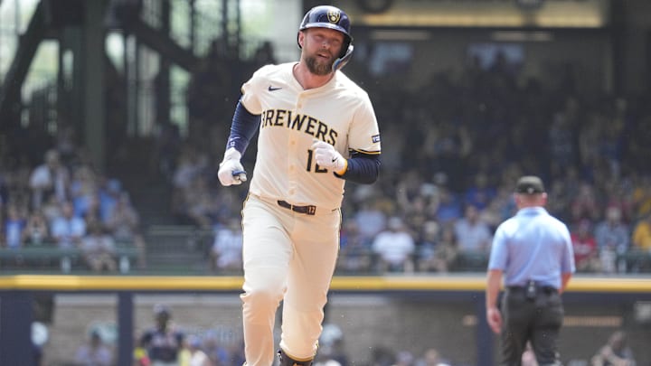 Jun 11, 2025: Milwaukee Brewers first baseman Rhys Hoskins (12) rounds the bases after hitting a home run against the Atlanta Braves in the second inning at American Family Field. 
