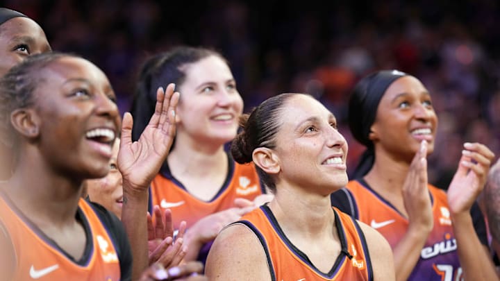Aug 3, 2023; Phoenix, Arizona, USA; Phoenix Mercury guard Diana Taurasi (3) celebrates her 10,000 career point milestone with teammates after the game against the Atlanta Dream at Footprint Center. Mandatory Credit: Joe Camporeale-Imagn Images