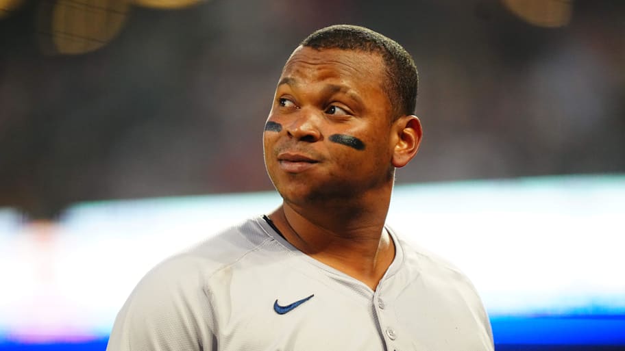 Boston Red Sox third base Rafael Devers (11) doubles in the sixth inning against the Colorado Rockies at Coors Field. | Ron Chenoy-Imagn Images