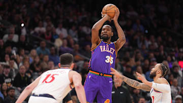 Mar 4, 2025; Phoenix, Arizona, USA; Phoenix Suns forward Kevin Durant (35) shoots over LA Clippers guard Amir Coffey (7) during the second half at PHX Center. Mandatory Credit: Joe Camporeale-Imagn Images
