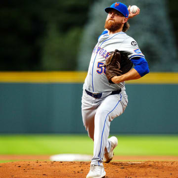 Aug 7, 2024; Denver, Colorado, USA; New York Mets starting pitcher Paul Blackburn (58) delivers a pitch in the first inning against the Colorado Rockies at Coors Field. Mandatory Credit: Ron Chenoy-USA TODAY Sports