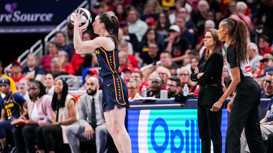 Indiana Fever guard Caitlin Clark (22) scores a 3-pointer Saturday, June 14, 2025, during a game between the Indiana Fever and the New York Liberty at Gainbridge Fieldhouse in Indianapolis. | Grace Smith/IndyStar / USA TODAY NETWORK via Imagn Images