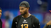 Mar 1, 2025; Indianapolis, IN, USA; Colorado quarterback Shedeur Sanders (QB13) during the 2025 NFL Combine at Lucas Oil Stadium. Mandatory Credit: Kirby Lee-Imagn Images