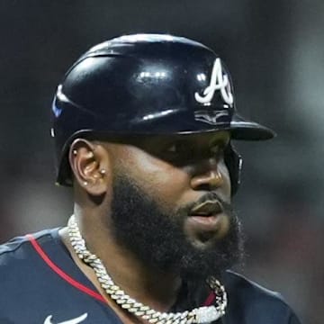 Atlanta Braves designated hitter Marcell Ozuna (20) draws a walk against the Cincinnati Reds in the eighth inning at Great American Ball Park on July 31. 