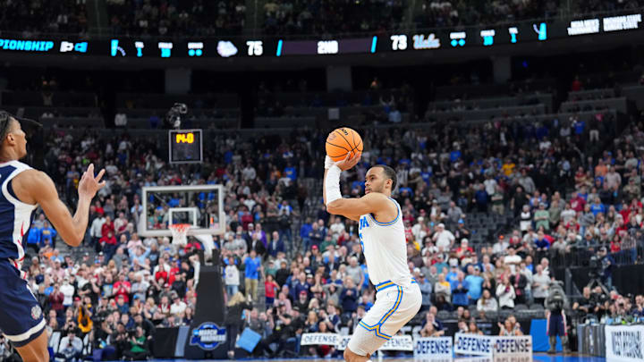 Mar 23, 2023; Las Vegas, NV, USA; UCLA Bruins guard Amari Bailey (5) makes a three point basket against the Gonzaga Bulldogs during the second half at T-Mobile Arena. Mandatory Credit: Joe Camporeale-Imagn Images