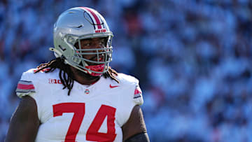 Ohio State Buckeyes offensive lineman Donovan Jackson (74) warms up prior to the NCAA football game against the Penn State Nittany Lions at Beaver Stadium in University Park, Pa. on Saturday, Nov. 2, 2024.