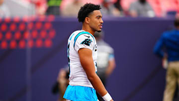 Oct 27, 2024; Denver, Colorado, USA; Carolina Panthers quarterback Bryce Young (9) before the game against the Denver Broncos at Empower Field at Mile High. Mandatory Credit: Ron Chenoy-Imagn Images